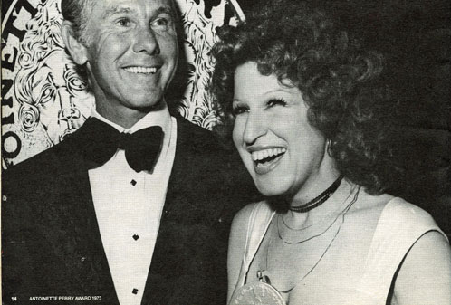 Johnny carson and a beaming bette